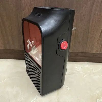 Tragbare schnelle Heizung 900w mit individuell verstellbarem Stecker in Mini Heizung Temperatur für Hotelzimmer